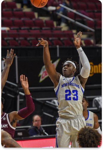 New Orleans Privateers number 23 shooting the ball