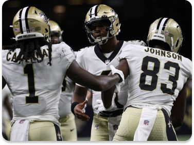 Orleans Saints celebrate after a touchdown against the Jacksonville Jaguars at Caesars Superdome.