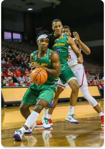 Tulane Green Wave guard Colin Slater (14) gets the rebound