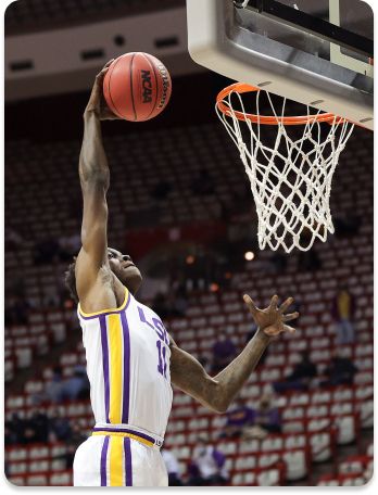 Josh LeBlanc Sr. #11 of the LSU Tigers dunks the ball